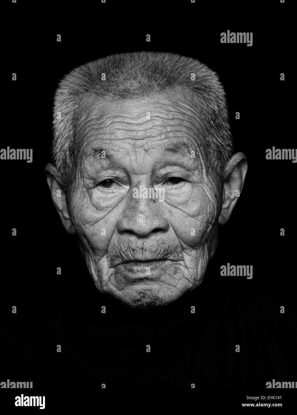 May 24, 2015 - CHN - CHINA - May 24 2015: (EDITORIAL USE ONLY. CHINA OUT)(MINIMUM PRICE: 100 USD) Liu Deqin: Male, born in 1924 and now lives in Maomingguangdong. He was caught for conscription and sent to 3rd Battlion 453rd Regiment 151st Division 62nd Corp National Revolutional Army. They had a fierce combat with Japanese army in Hengyang Hunan in 1941, it lasted from 4th May to 13th September, and 10th Corp defended the inside city, 62th Corp stationed outside the city. When 10th Corp was surrounded by enemies, 453rd Regiment was surrounded by Japanese for 3 days in Hengyang Santang, and no Stock Photo