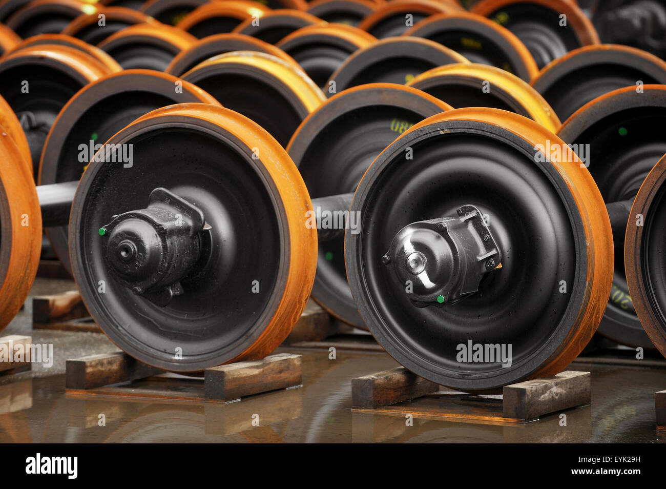 New train wheels on the factory production line Stock Photo
