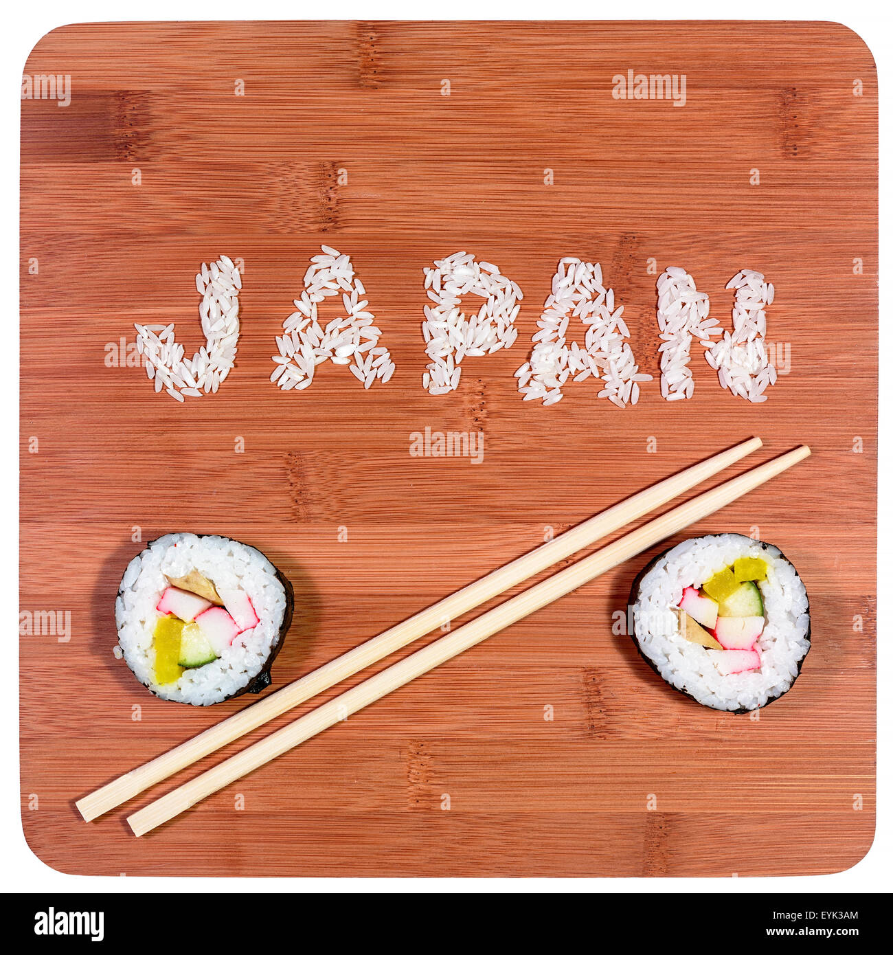 japan rice written with sushi pieces and chopstick on bamboo Stock Photo