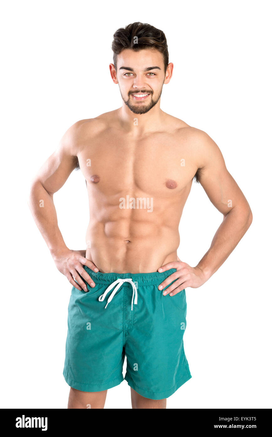 Handsome and fit young man with great abs isolated in white Stock Photo