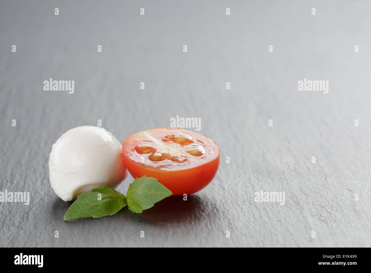 mozzarella balls with tomatoes and basil Stock Photo