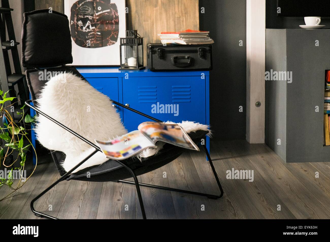 Sitting room with vintage styled armchair Stock Photo - Alamy