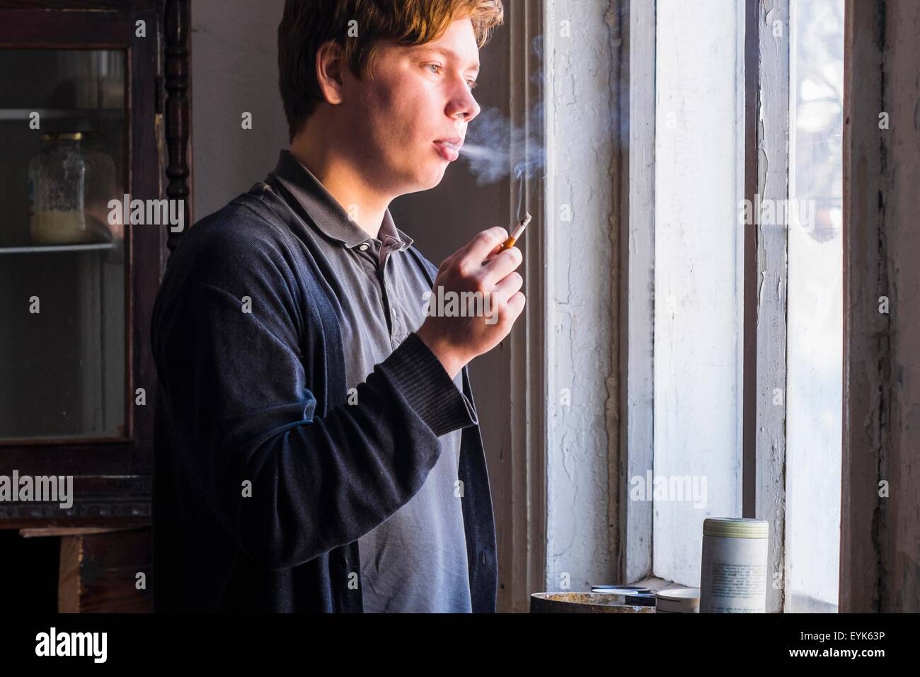 Man Staring Out Window High Resolution Stock Photography and Images Alamy