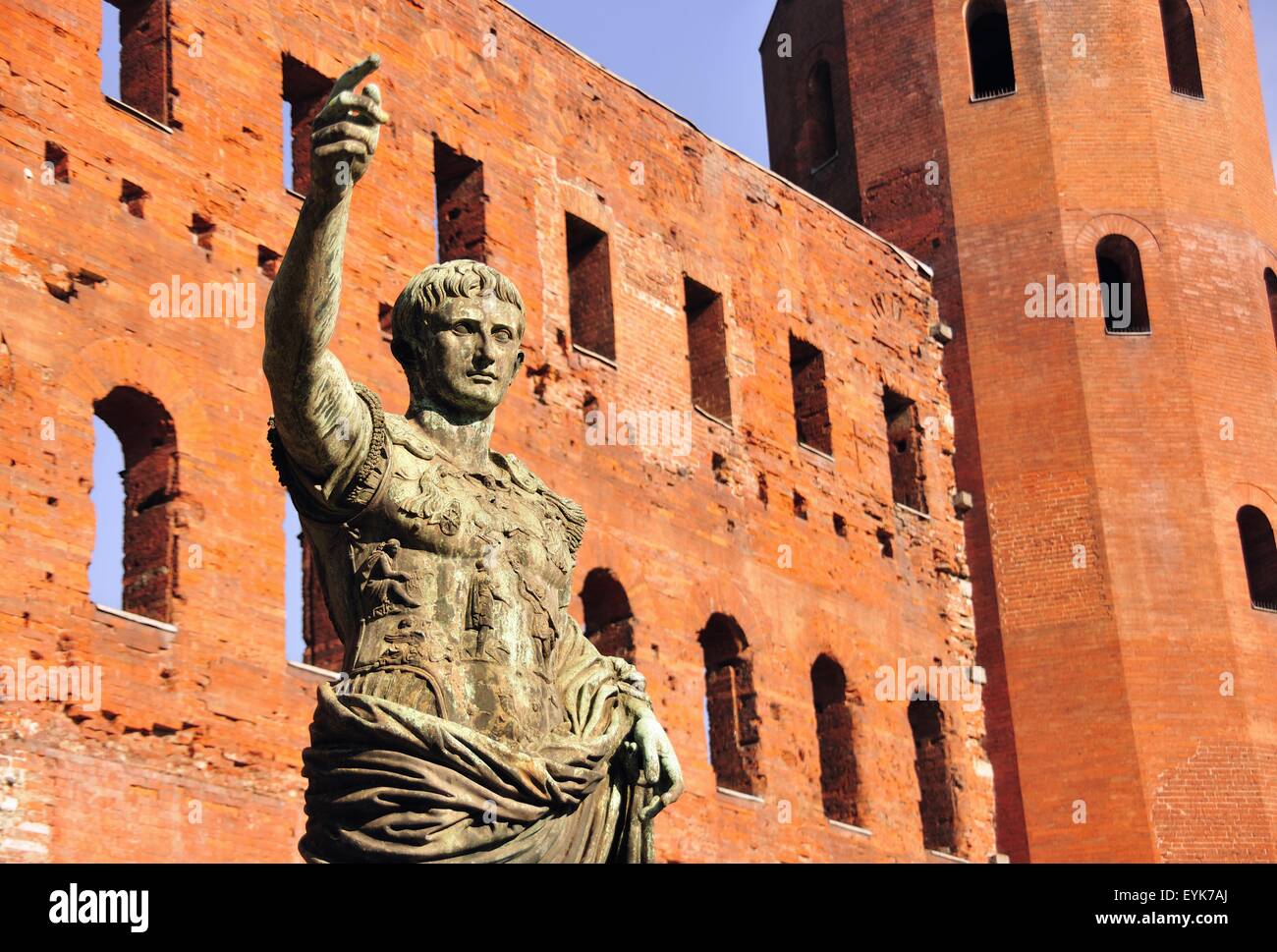Ancient Roman bronze statue of Emperor Caesar, Porte Palatine city gate, Turin, Piedmont, Italy Stock Photo