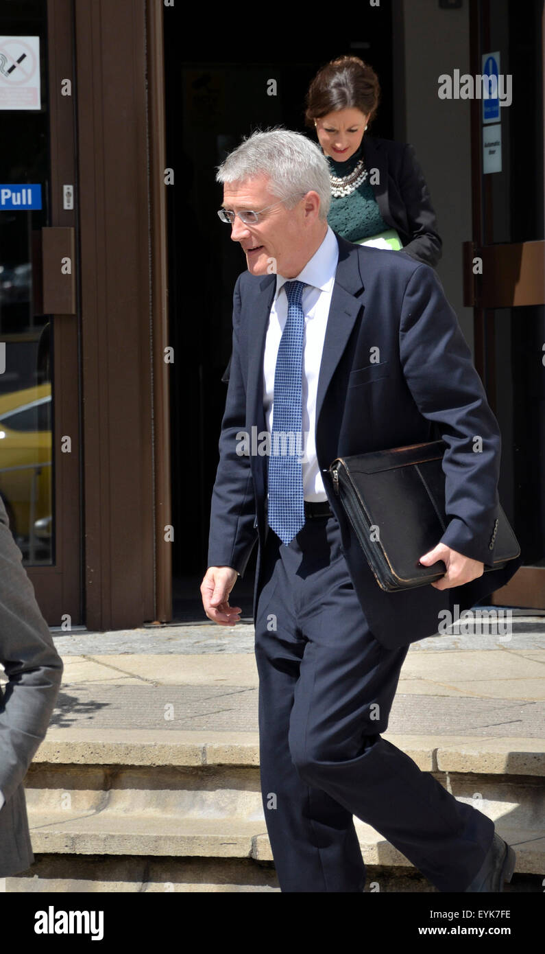 Maidstone, Kent, UK. 31st July, 2015. Andrew Jones MP, the new Minister for Operation Stack, leaves County hall, Maidstone after a meeting with local MPs and the County Council. The meeting was scheduled to last 60 minutes but went on for two hours with another meeting convened in a neighbouring building after he left Credit:  PjrNews/Alamy Live News Stock Photo