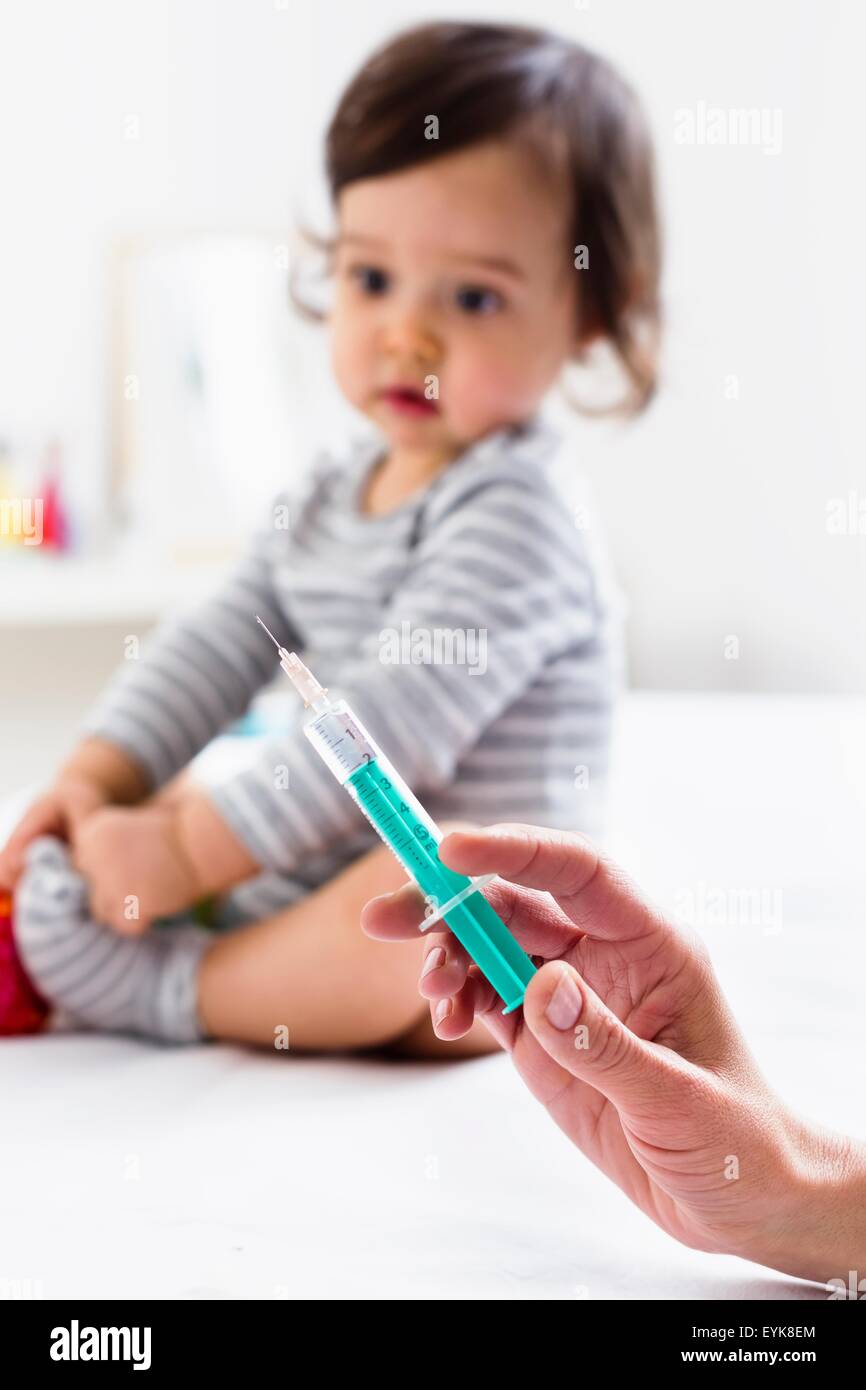 Baby and injection hires stock photography and images Alamy