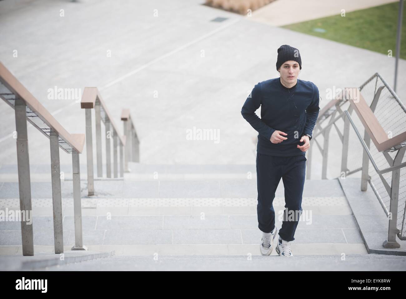 Male running up stairs hi-res stock photography and images - Alamy