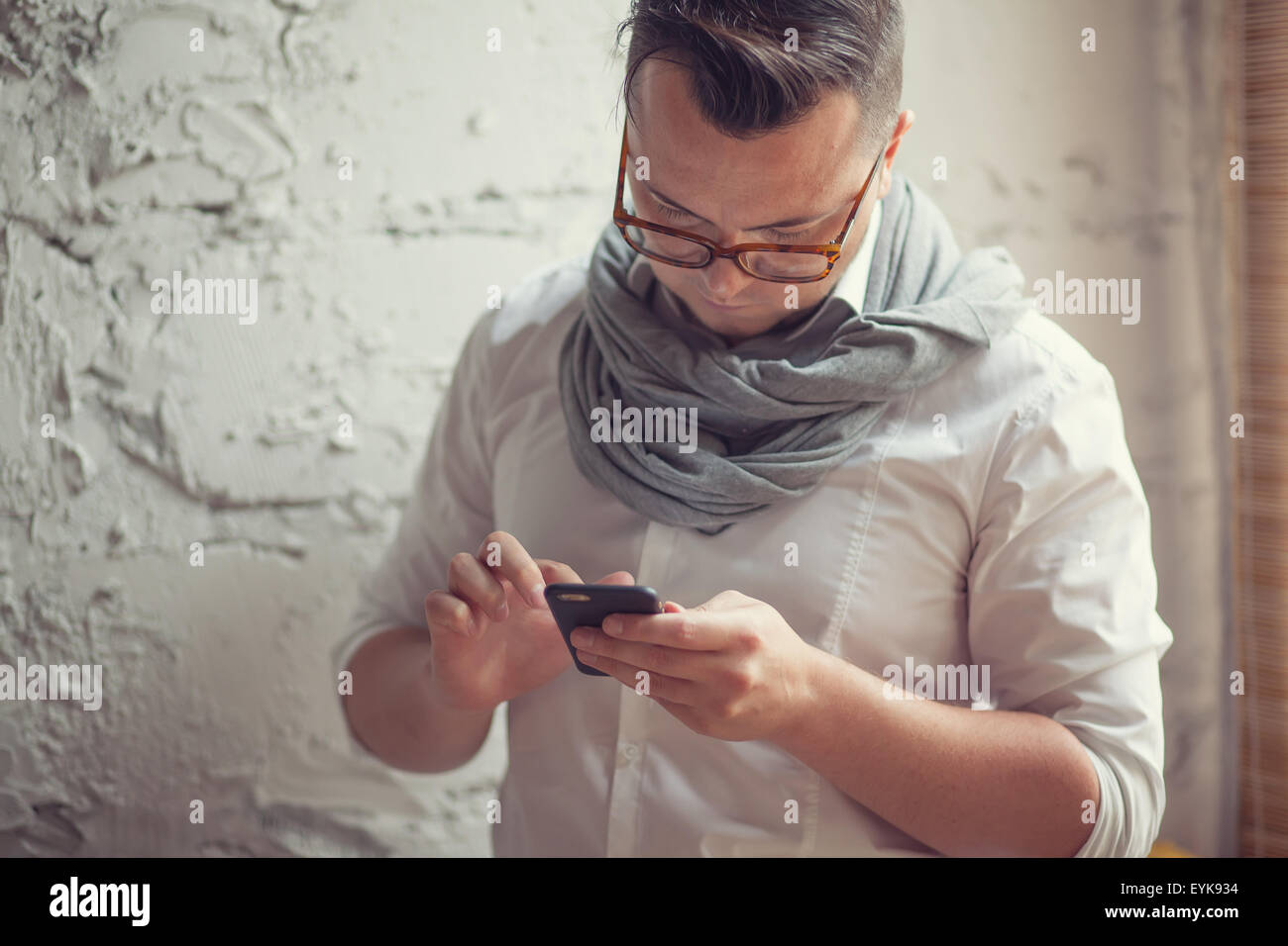 Trendy man working in startup office Stock Photo
