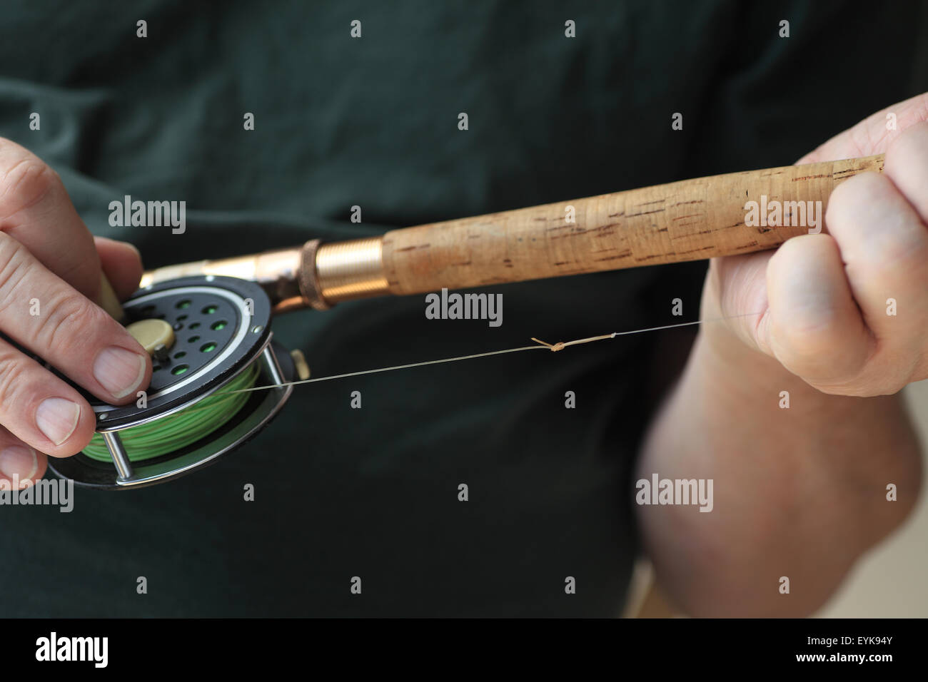 A man with his fly fishing rod and reel, copy space included Stock Photo