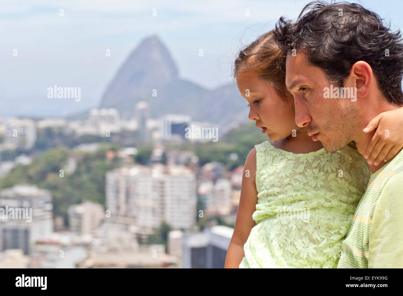 Father and daughter looking at view, Rio de Janeiro, Brazil Stock Photo