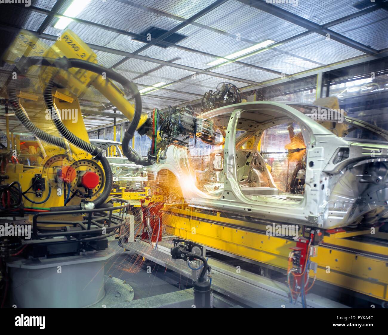 Car body welding robots in car factory Stock Photo - Alamy