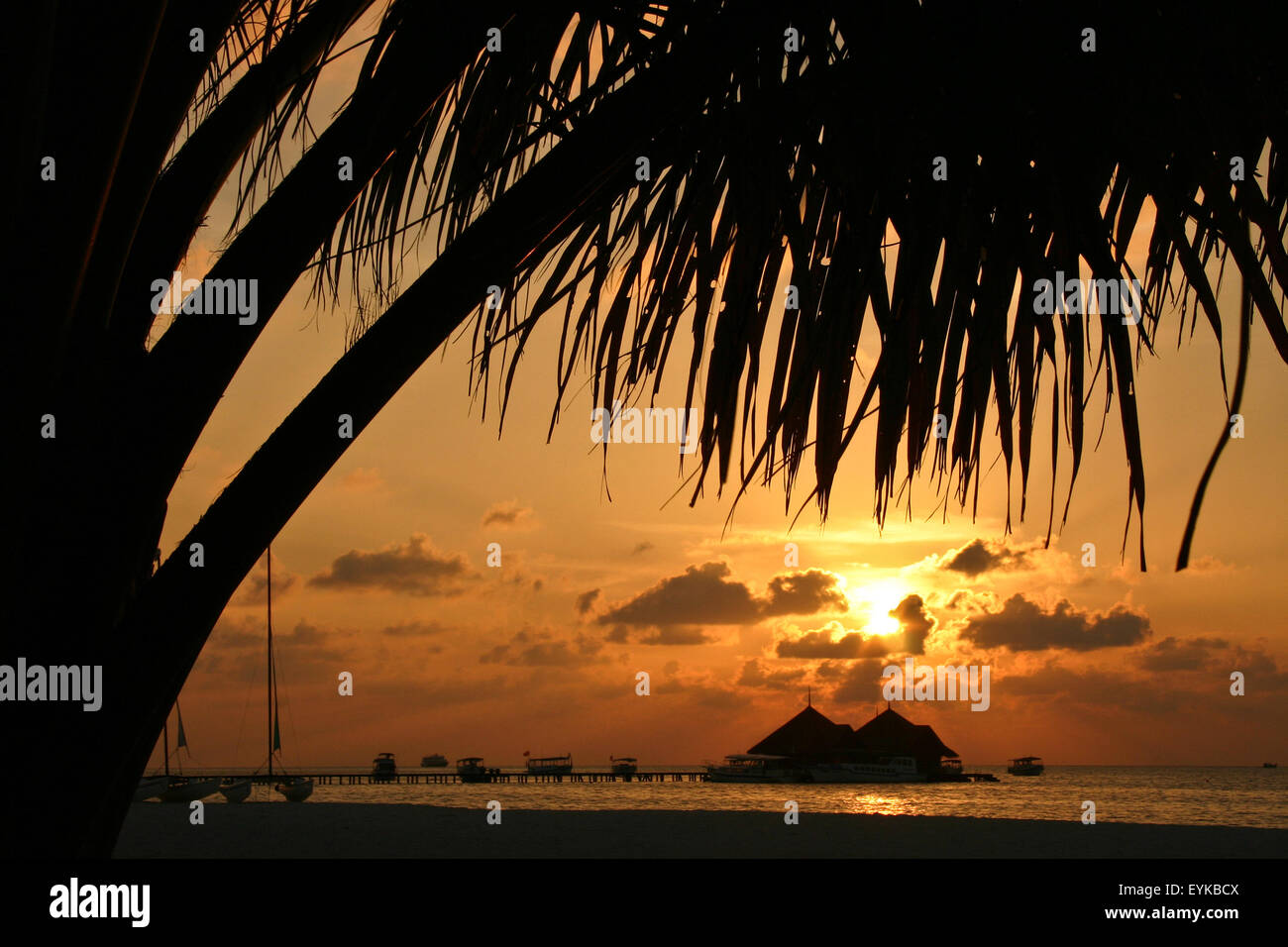 Sunset at the maldivian islands Stock Photo