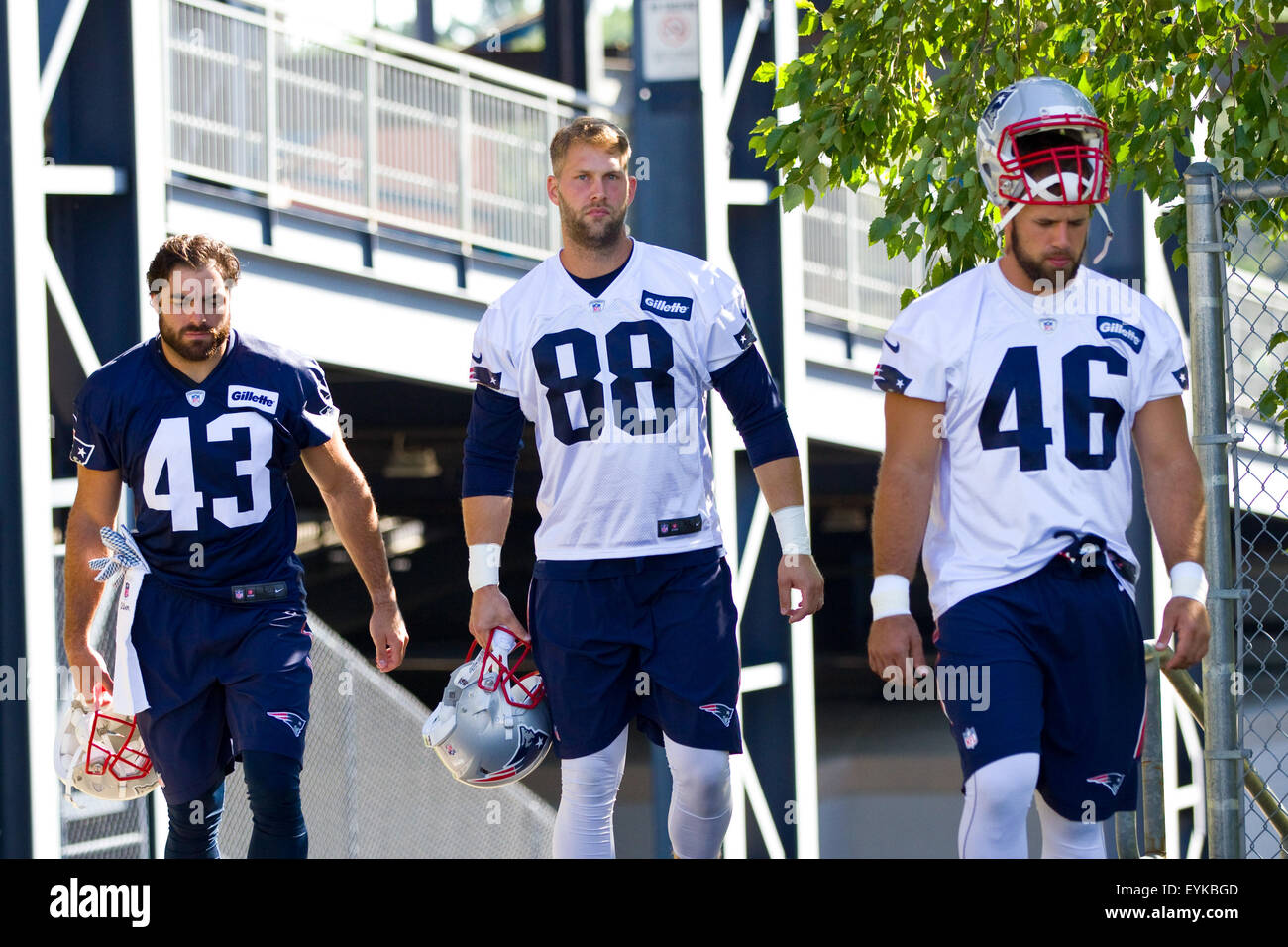 Gillette Stadium. 31st July, 2015. New England Patriots defensive back Nate Ebner (43), New England Patriots tight end Scott Chandler (88) and New England Patriots fullback James Devlin (46) take the field during NFL training camp at Gillette Stadium. Credit:  Cal Sport Media/Alamy Live News Stock Photo