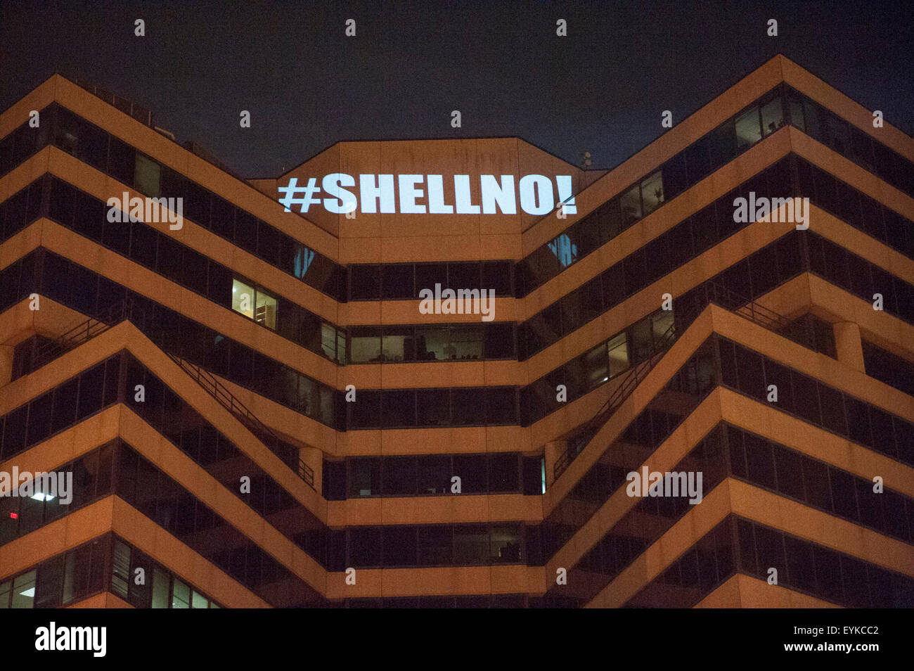 Washington, DC, USA. 30th July, 2015. Messages calling for action on climate change and attacking corporate polluters are projected on the headquarters of the American Petroleum Institute by the Sierra Club in collaboration with a group known as The Illuminators. © Jay Mallin/ZUMA Wire/Alamy Live News Stock Photo