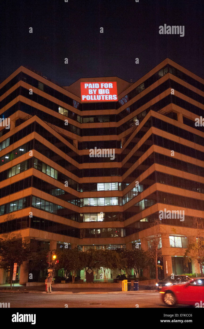 Washington, DC, USA. 30th July, 2015. Messages calling for action on climate change and attacking corporate polluters are projected on the headquarters of the American Petroleum Institute by the Sierra Club in collaboration with a group known as The Illuminators. © Jay Mallin/ZUMA Wire/Alamy Live News Stock Photo