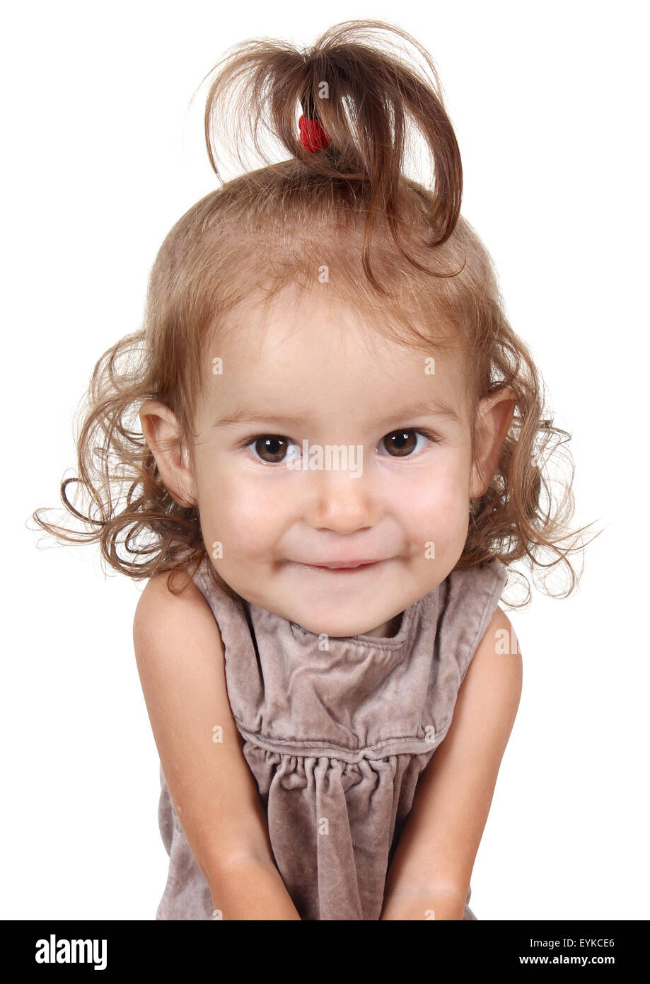 Portrait of funny big head child girl on white background Stock Photo