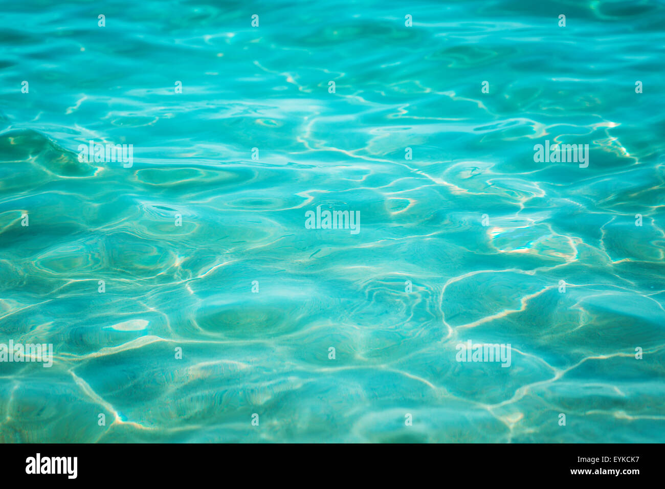 Blue sea water surface background Stock Photo - Alamy