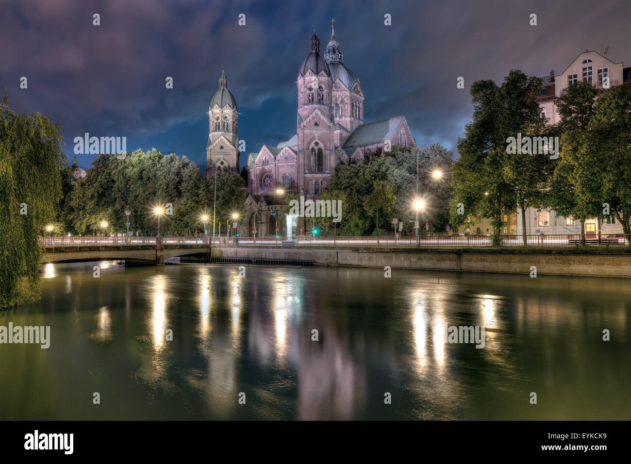 St Luke’s Church in Munch at night, alongside the River Isar. Stock Photo