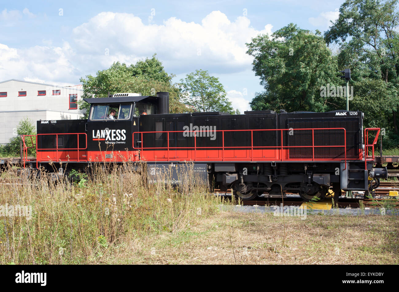 Mak 1206 diesel locomotive waiting at signal red light, Duisburg, North Rhine-Westphalia, Germany. Stock Photo