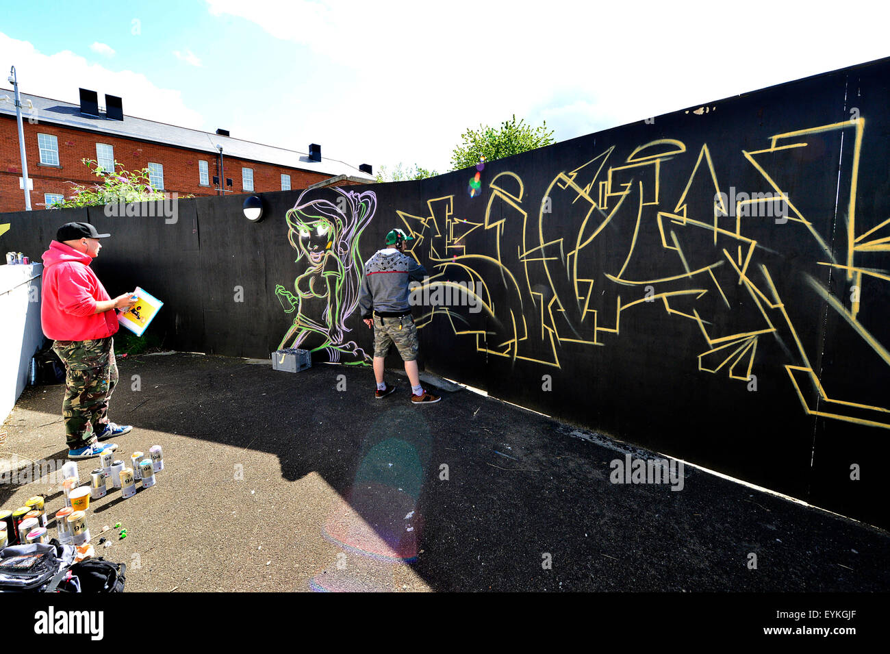 Graffiti artists display their skills in Ebrington Square, Londonderry. Stock Photo