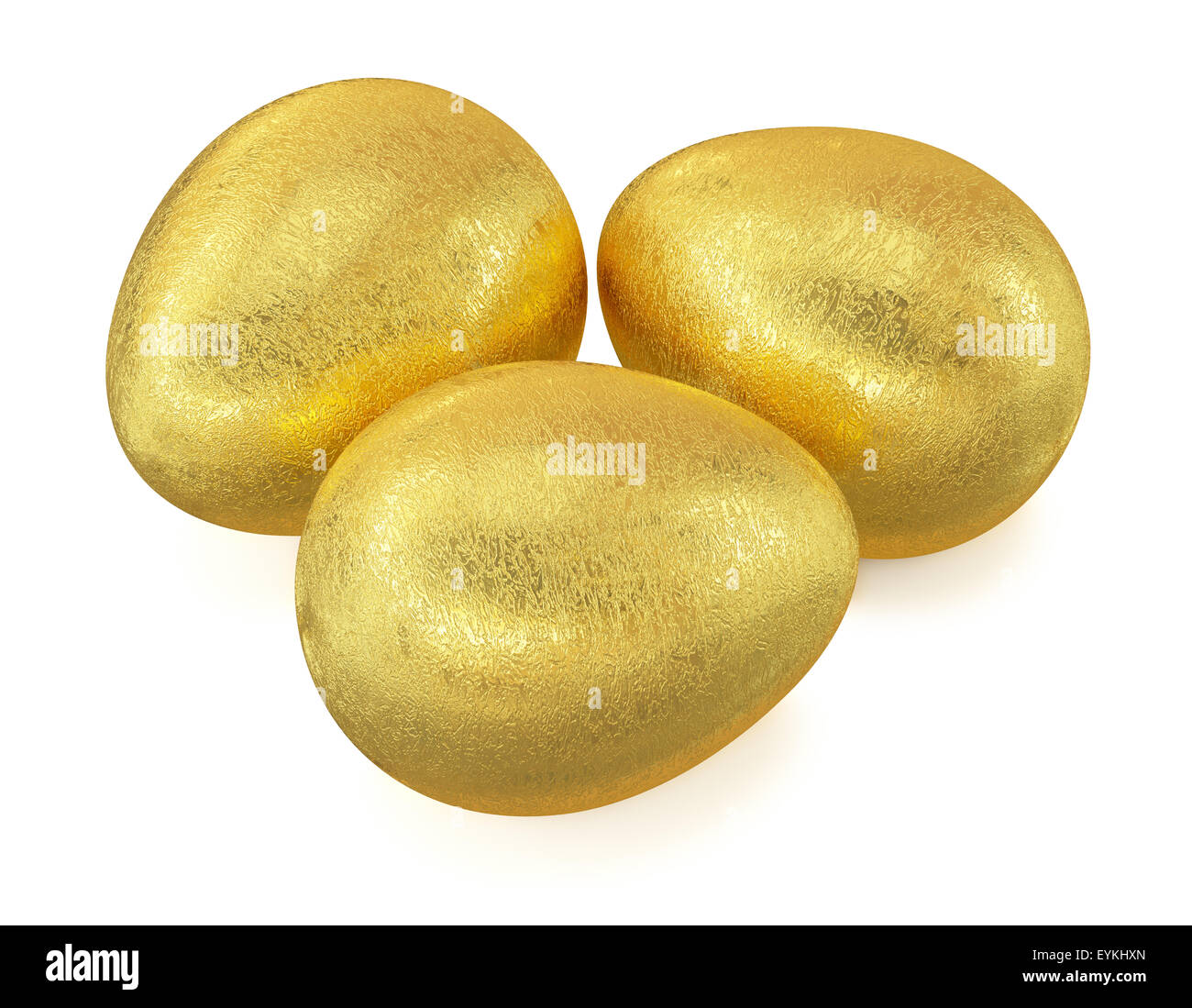 Three golden Easter eggs isolated on white background Stock Photo