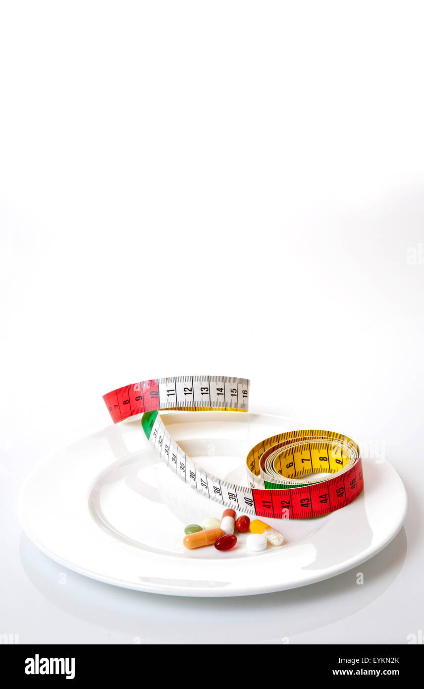 Diet, plate, the pills, dimension tape, food Stock Photo Alamy