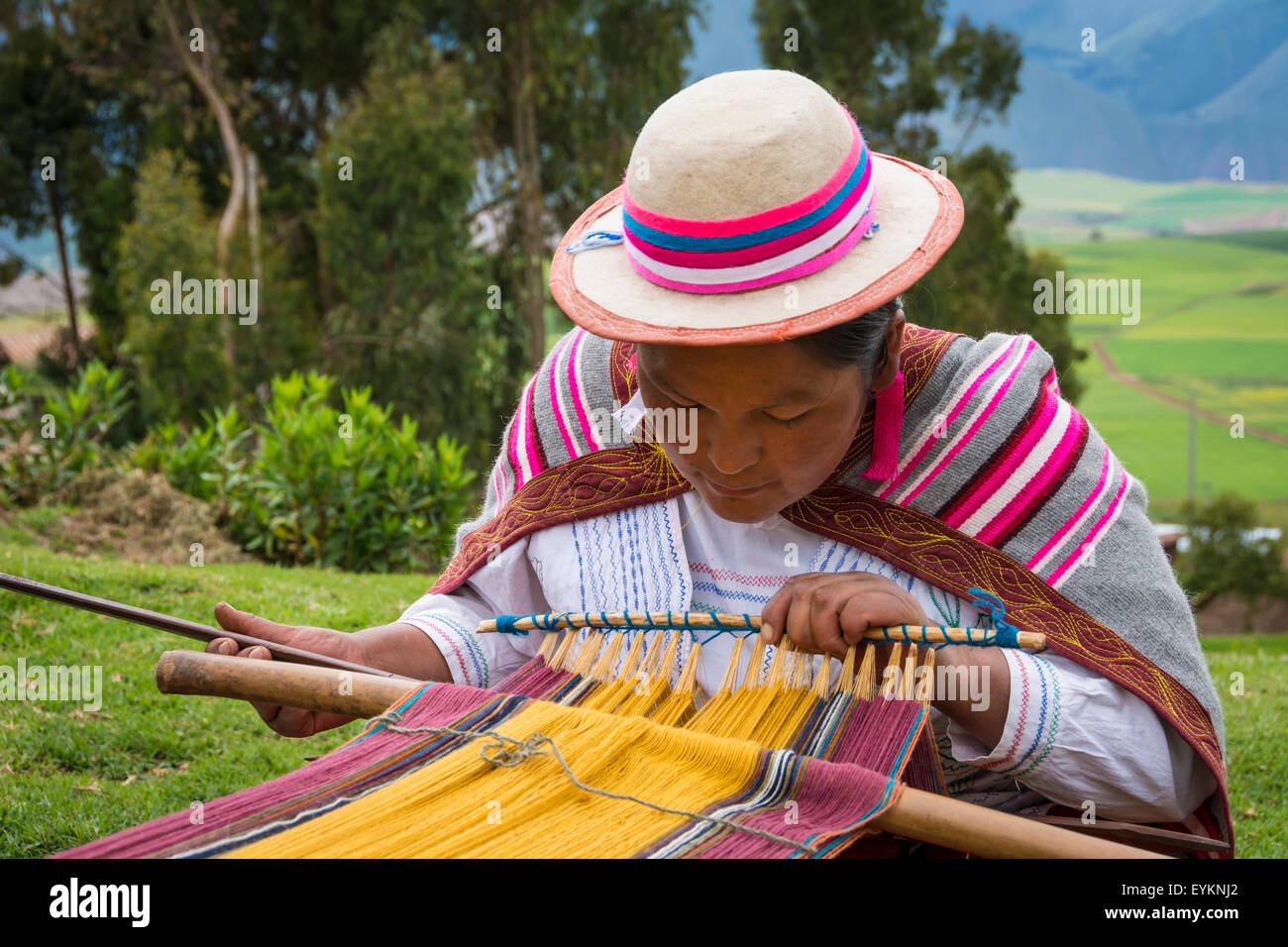 Quechua woman weaving cloth in Misminay Village, Sacred Valley, Peru. Stock Photo
