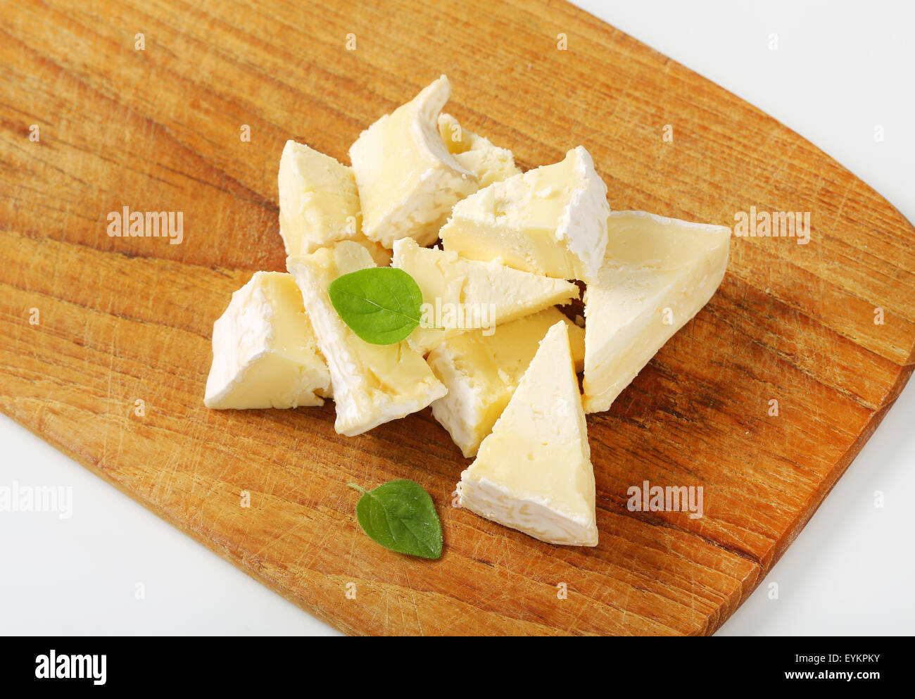 Pieces of French white rind cheese Stock Photo Alamy