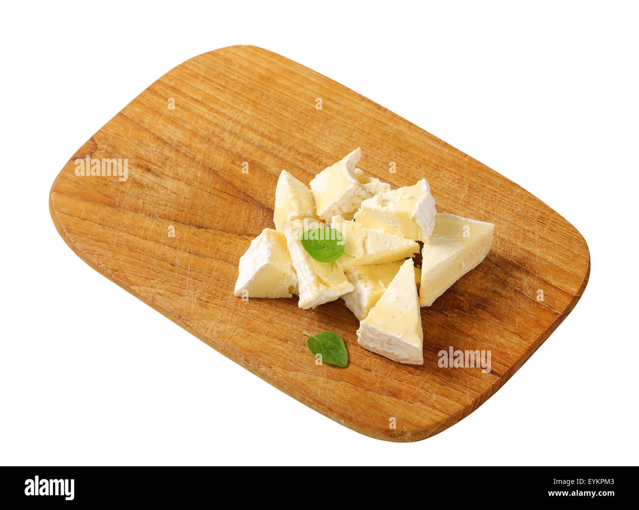 Pieces of French white rind cheese Stock Photo