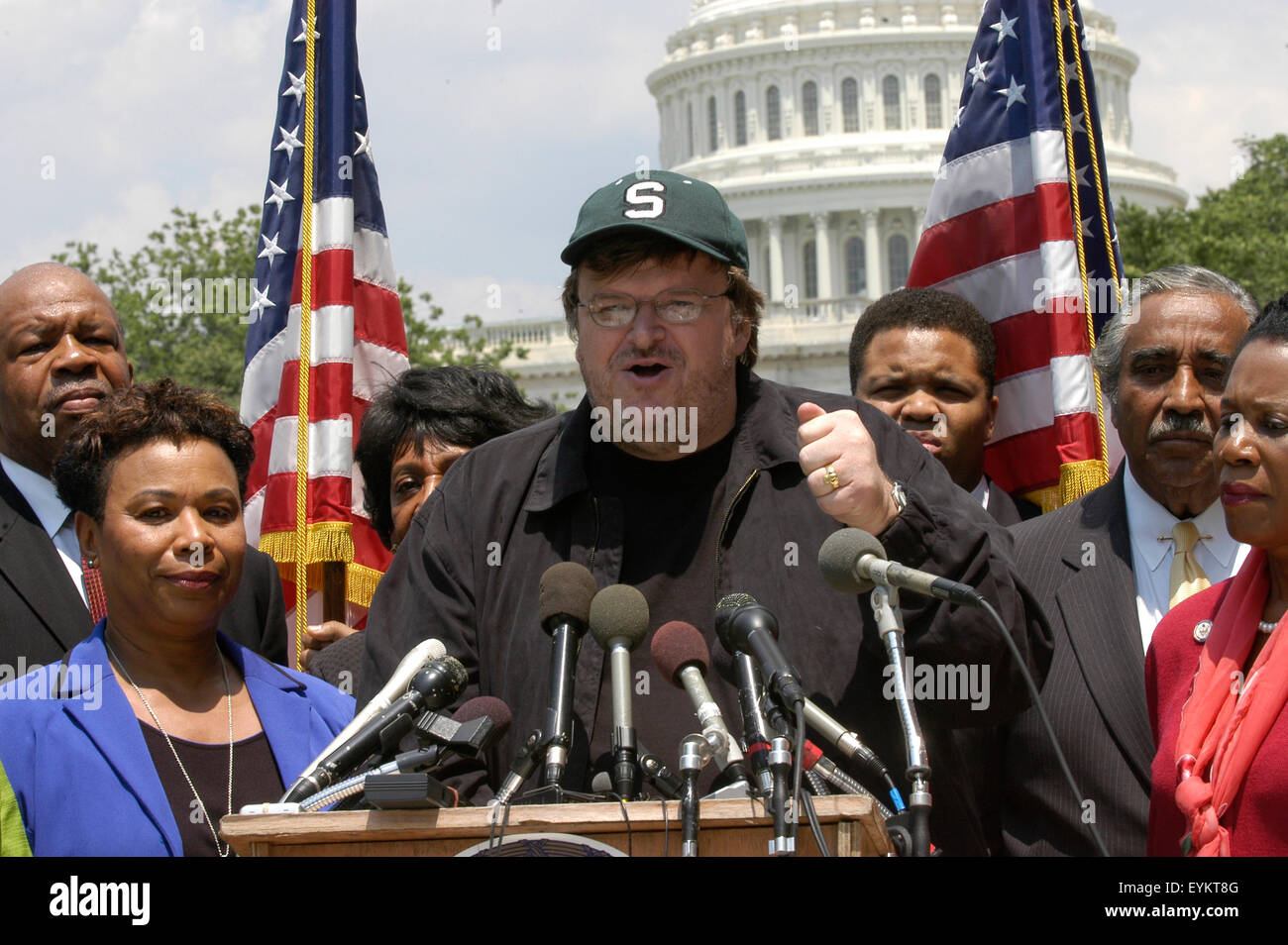 Filmmaker Michael Moore speaks during a news conference at Capitol Hill in Washington DC. The premiere of his new movie 'Fahrenheit 9/11'  is sending US political temperatures to the boiling point in a tense electoral year. Stock Photo