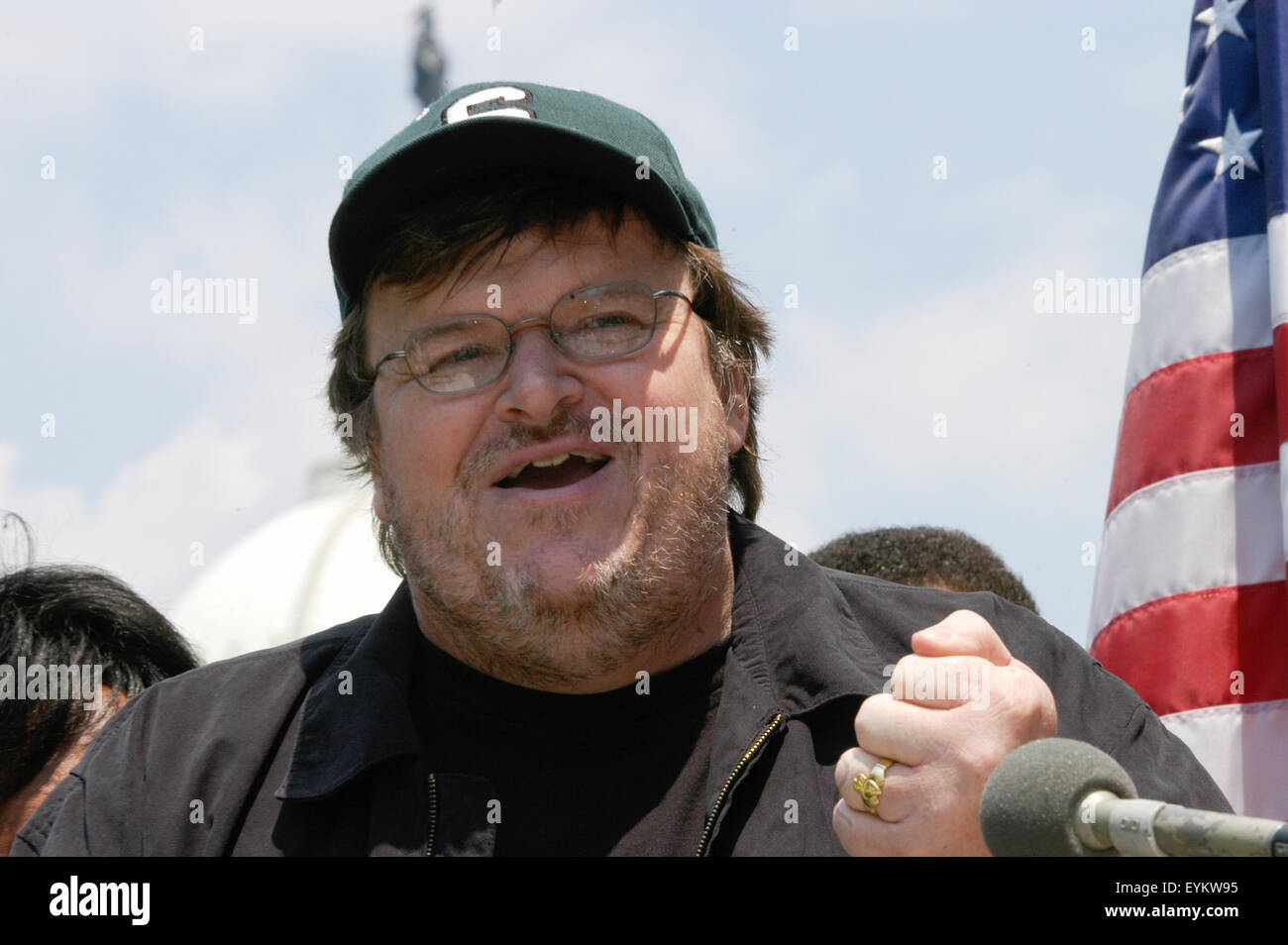 Filmmaker Michael Moore speaks during a news conference at Capitol Hill in Washington DC. The premiere of his new movie 'Fahrenheit 9/11'  is sending US political temperatures to the boiling point in a tense electoral year. Stock Photo