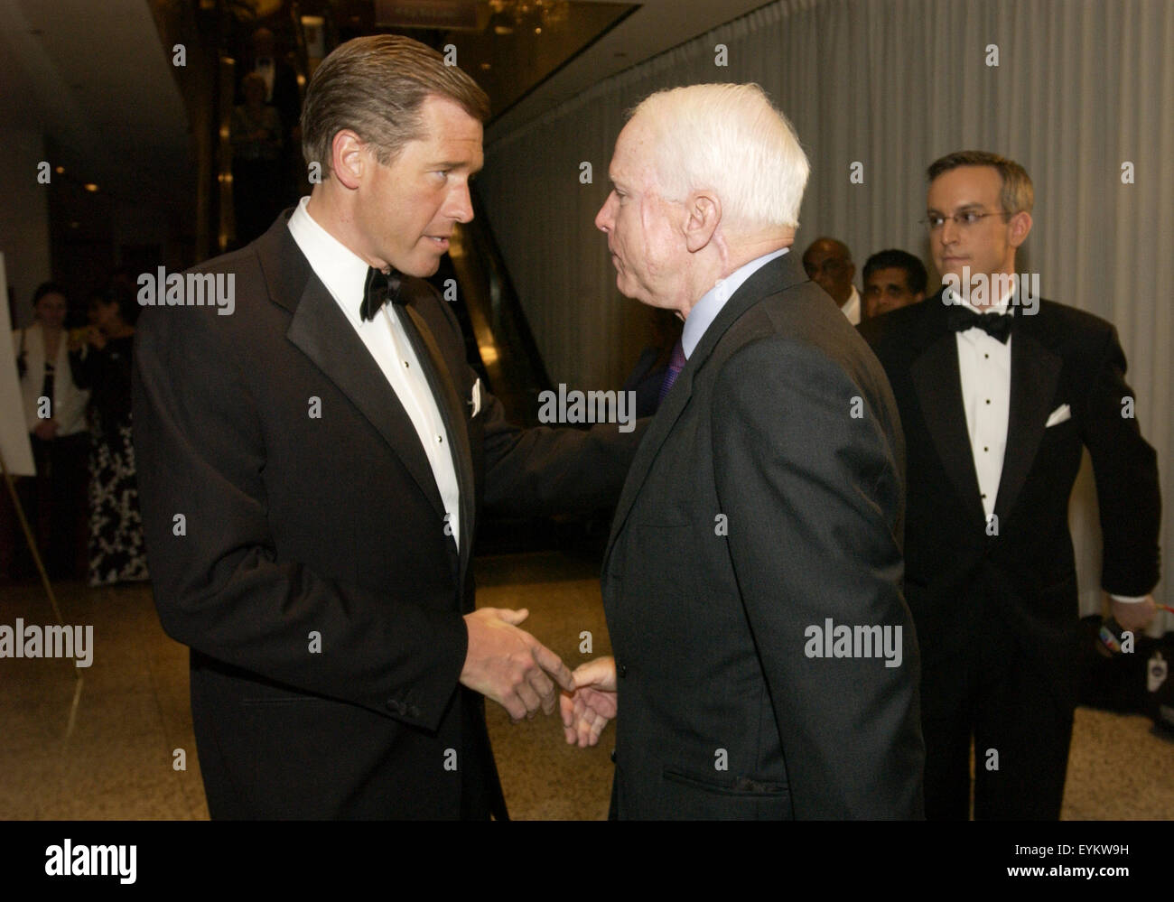 Senator John McCain (R-AZ) speaks with Brian Williams before the black tie 60th annual Radio and Television Correspondents Association Dinner in Washington. U.S. President George W. Bush was the guest of honor at the event. Stock Photo