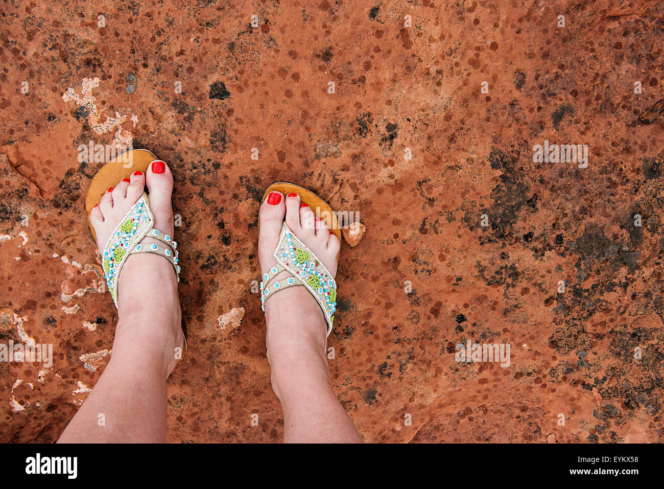 Selfie of feet standing on red rock in Sedona, Arizona. Stock Photo