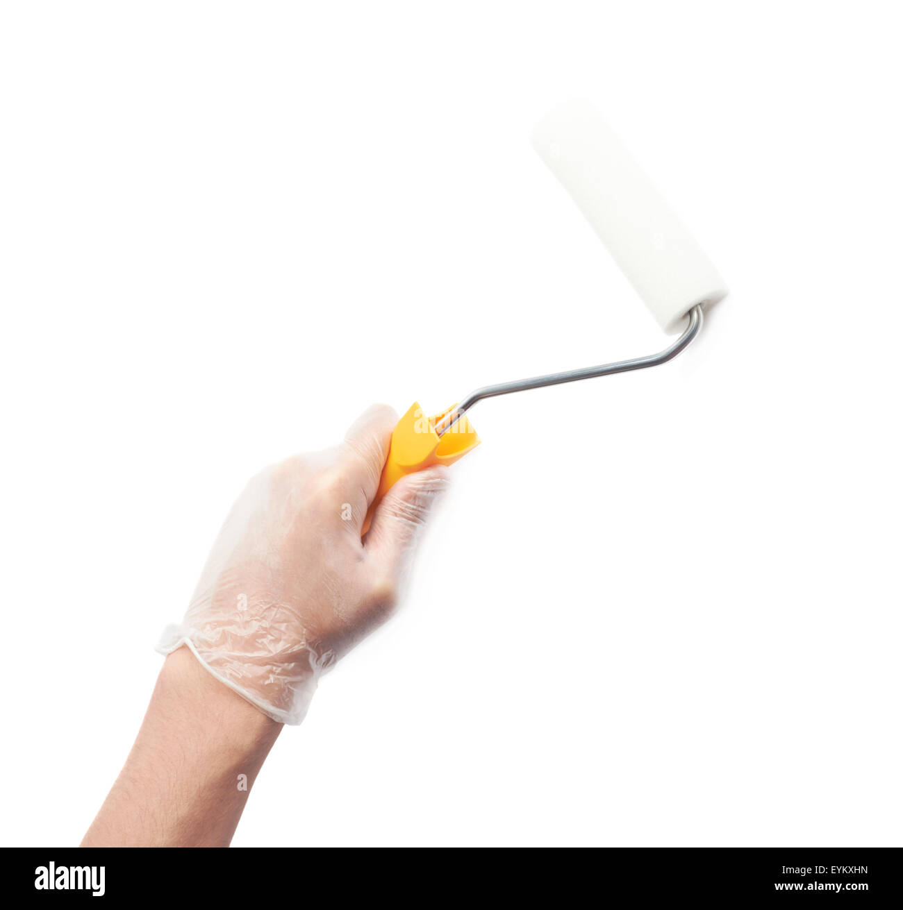 Hand holding a new paint roller Stock Photo Alamy