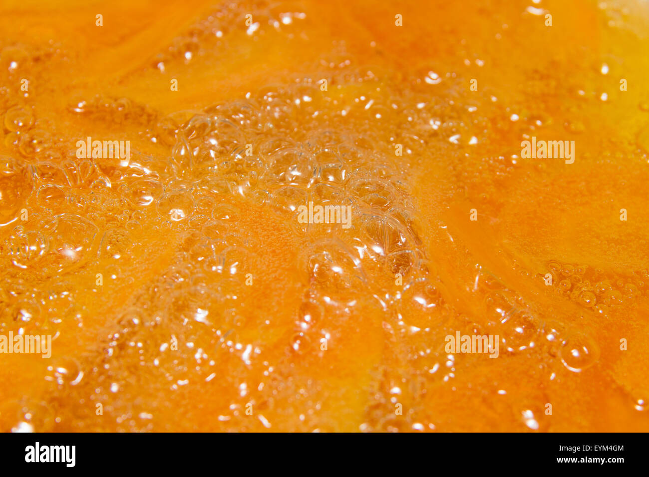 deep frying sliced carrot to make vegetable crisps Stock Photo Alamy