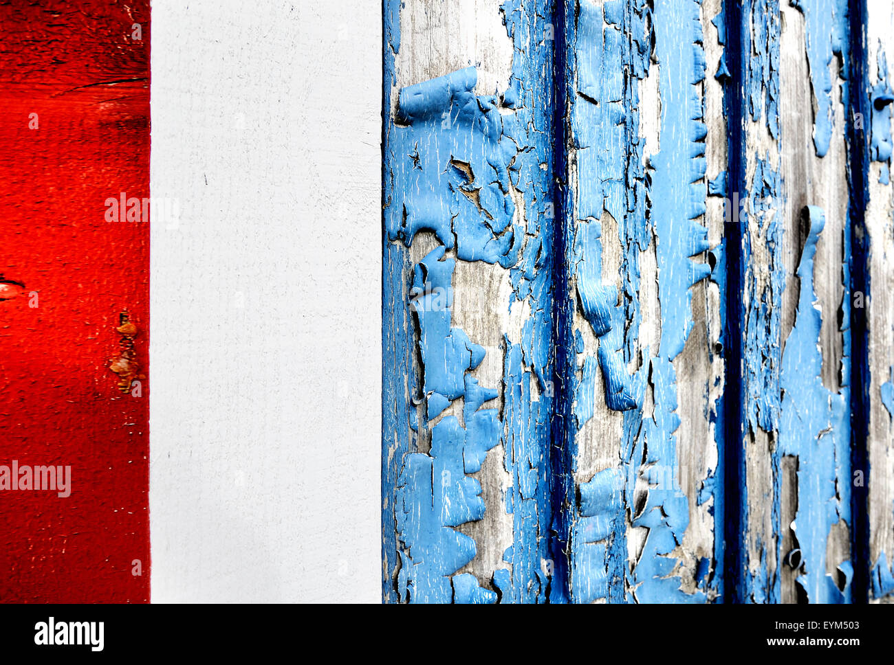 Wooden wall, paint, red, knows, flake off blue, old, closeup Stock
