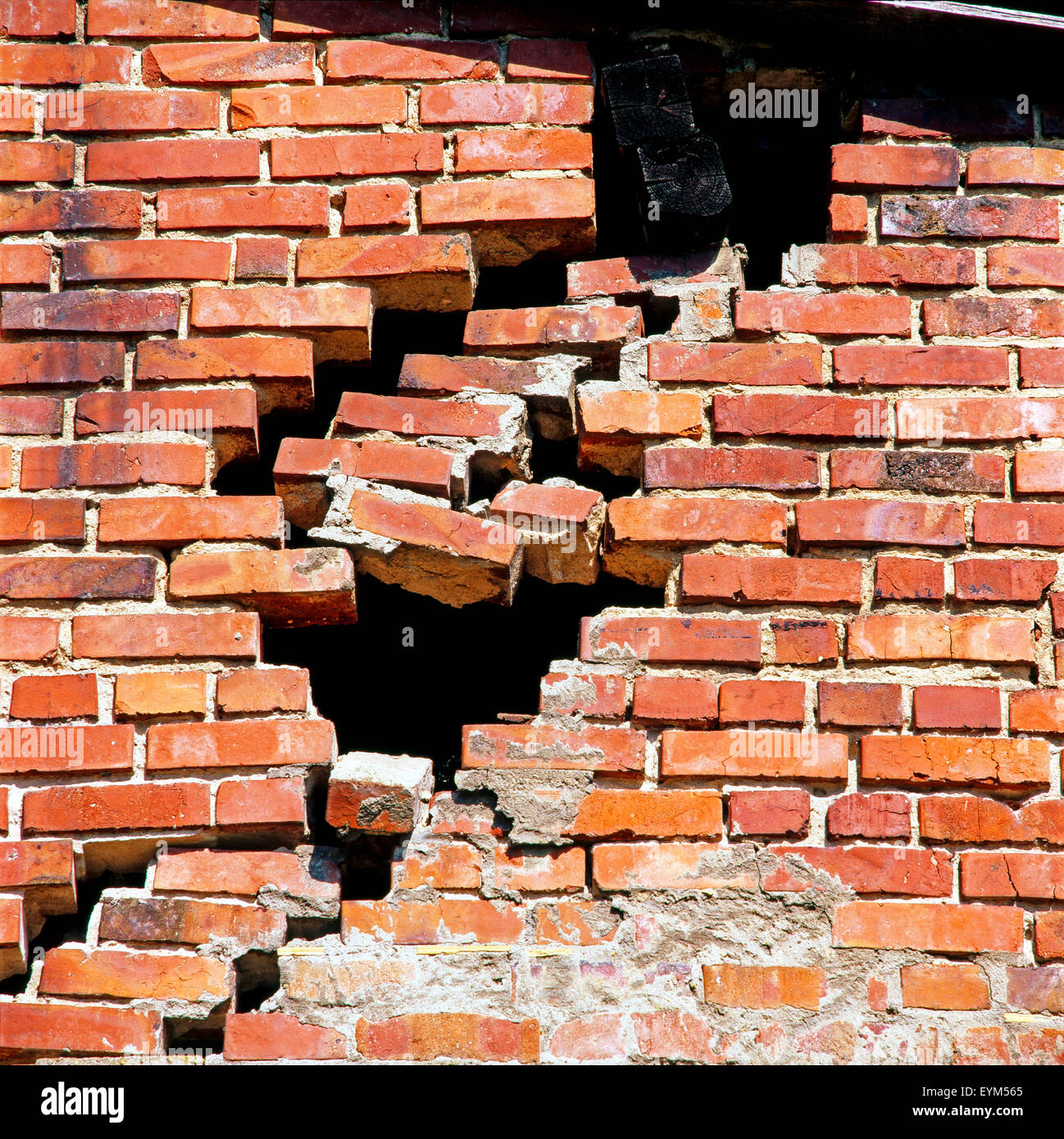 Defective brick wall threatens to collapse, botch-up at construction, Stock Photo