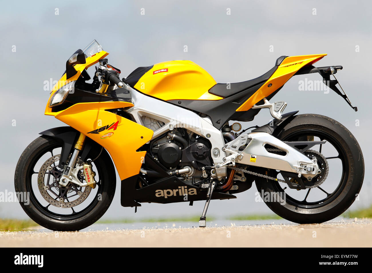 Motorcycle, Aprilia RSV 4, yellow, static, side standard left, Stock Photo