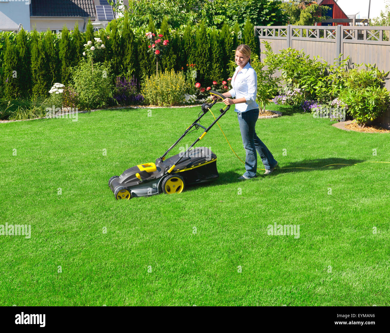 turf, lay, garden, woman, lawns, lawn mower, mow Stock Photo