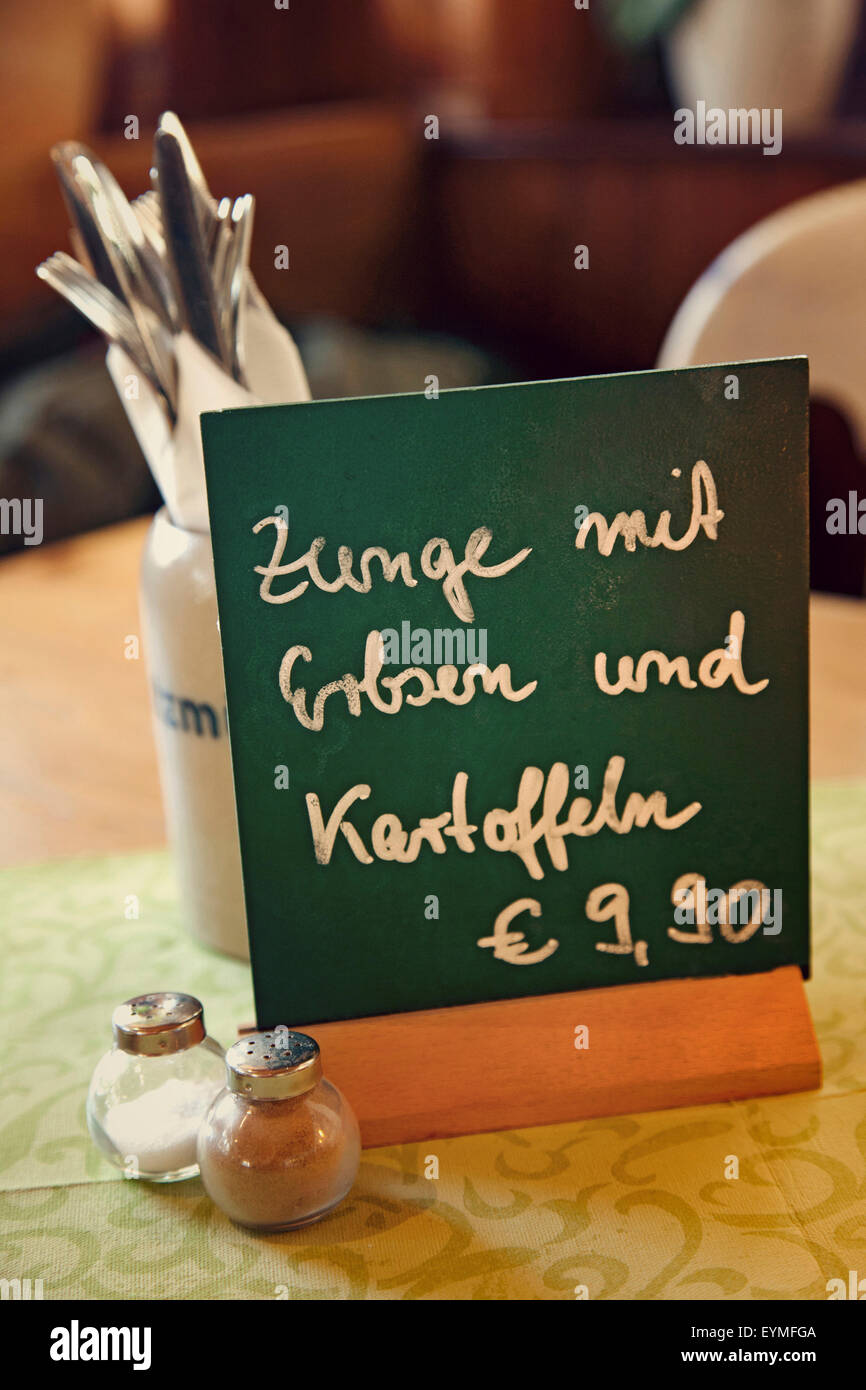 Restaurant, table, small blackboard, offer Stock Photo Alamy
