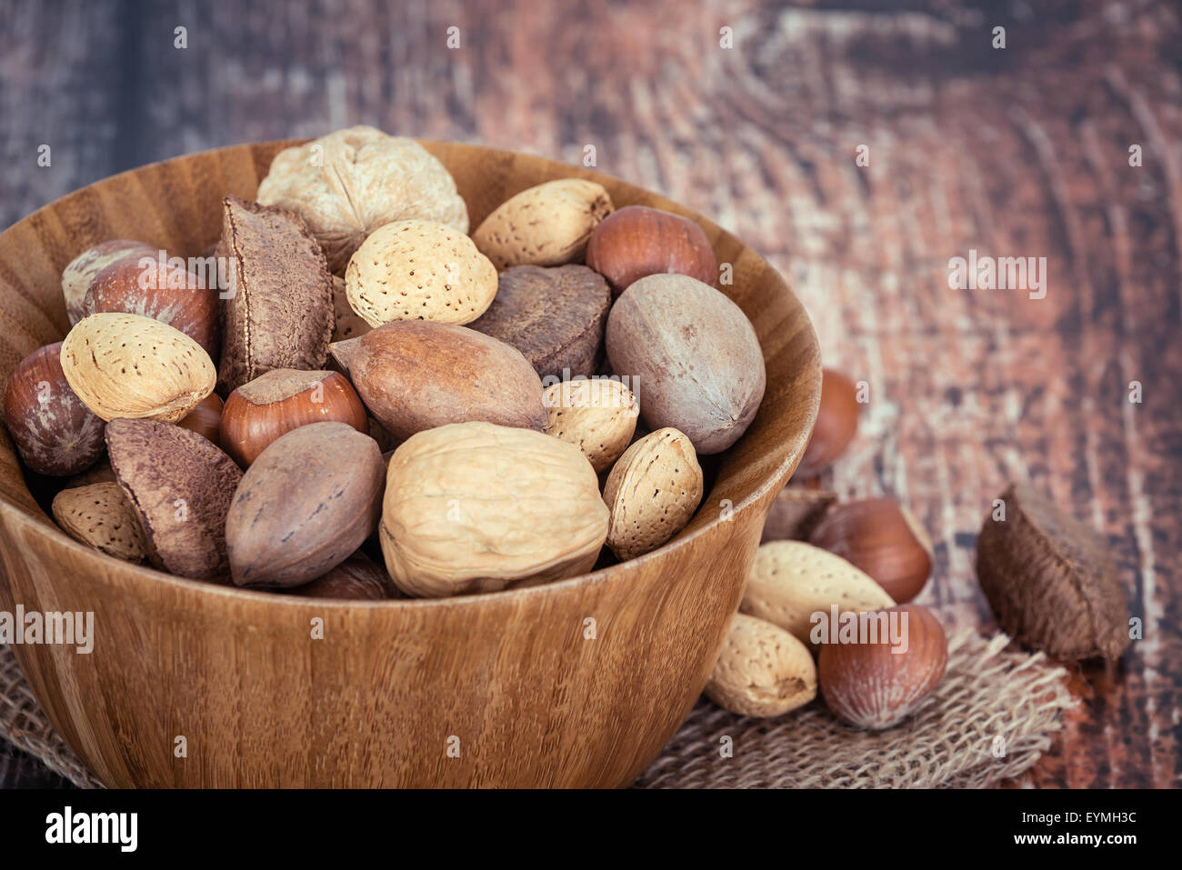Mix nuts with almonds, walnuts, hazelnuts, pecans, and Brazil nuts in a