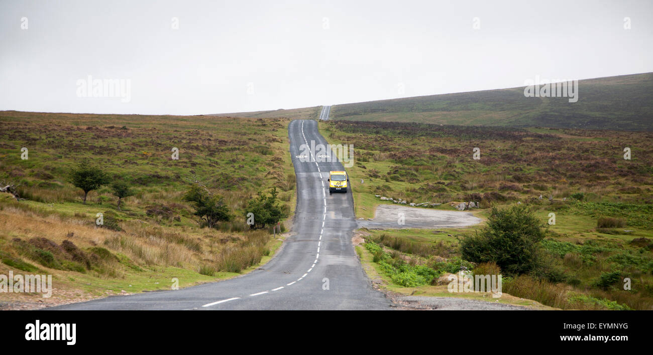 Road crossing moorland near Postbridge, Dartmoor national park, Devon, England, UK Stock Photo