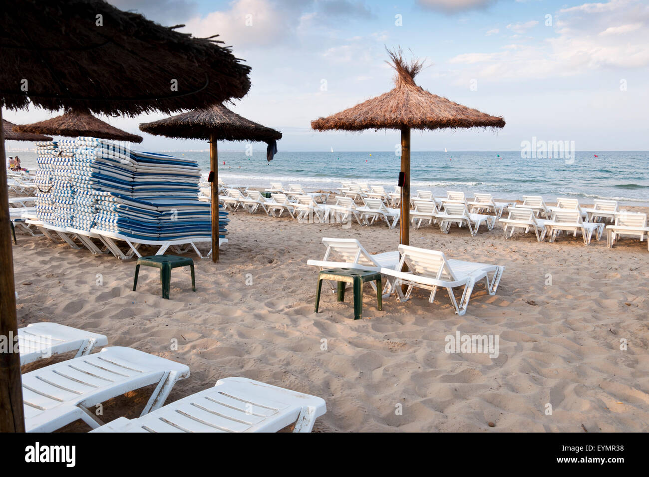 Sun loungers at Mediterranean beach, Alicante, Spain Stock Photo Alamy