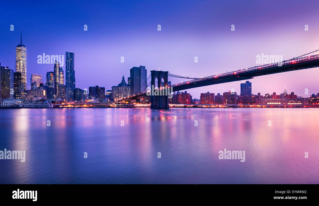 New York City - beautiful sunrise over manhattan with manhattan and brooklyn bridge USA Stock Photo