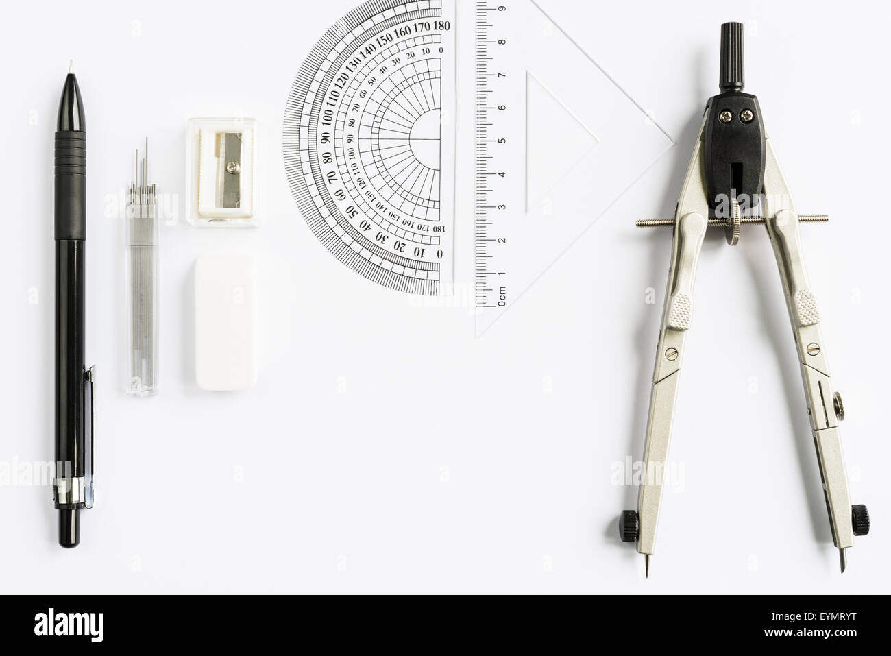 Set of measuring tools with compass, pencil and rulers on white background from above Stock