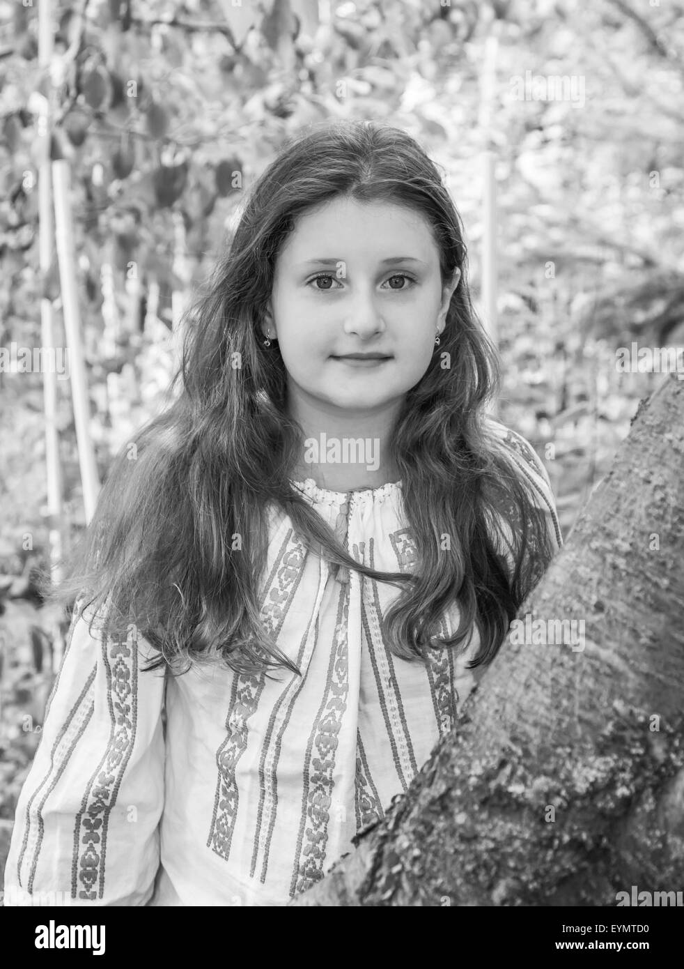 Beautiful girl wearing white blouse Black and White Stock Photos