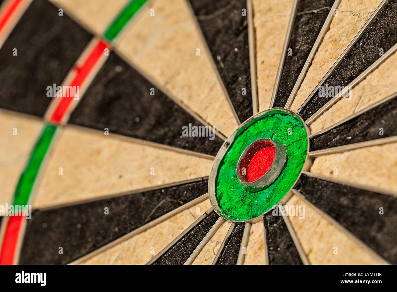 Success hitting target aim goal achievement concept background - bull's eye of darts board close up Stock Photo