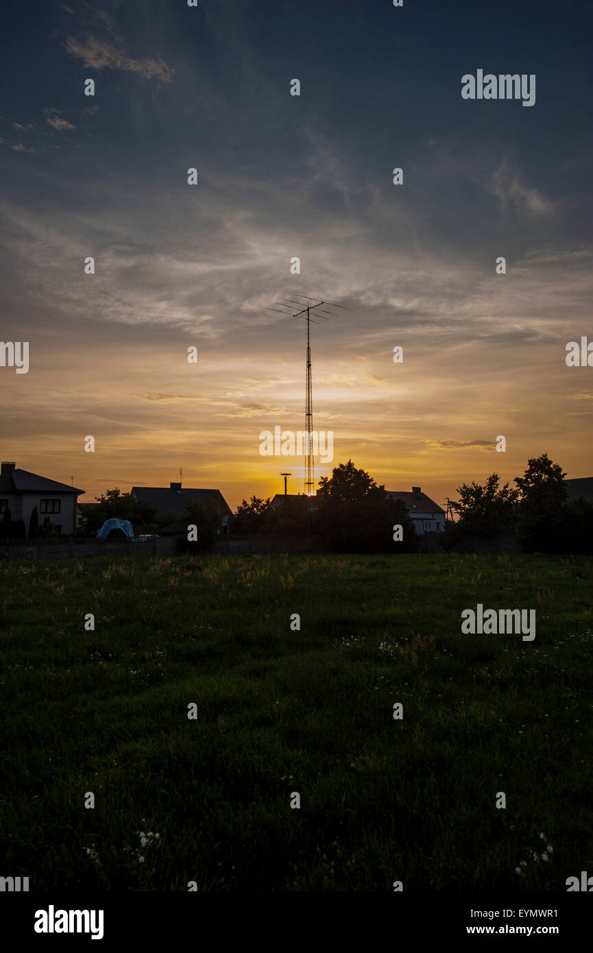 Amateur Radio antenna in north-eastern Poland at sunset. Stock Photo