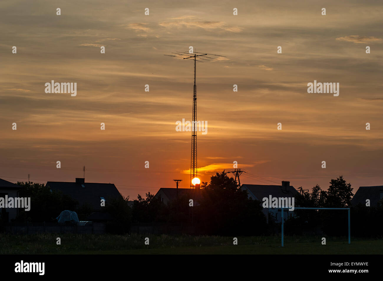 Amateur Radio antenna in north-eastern Poland at sunset. Stock Photo
