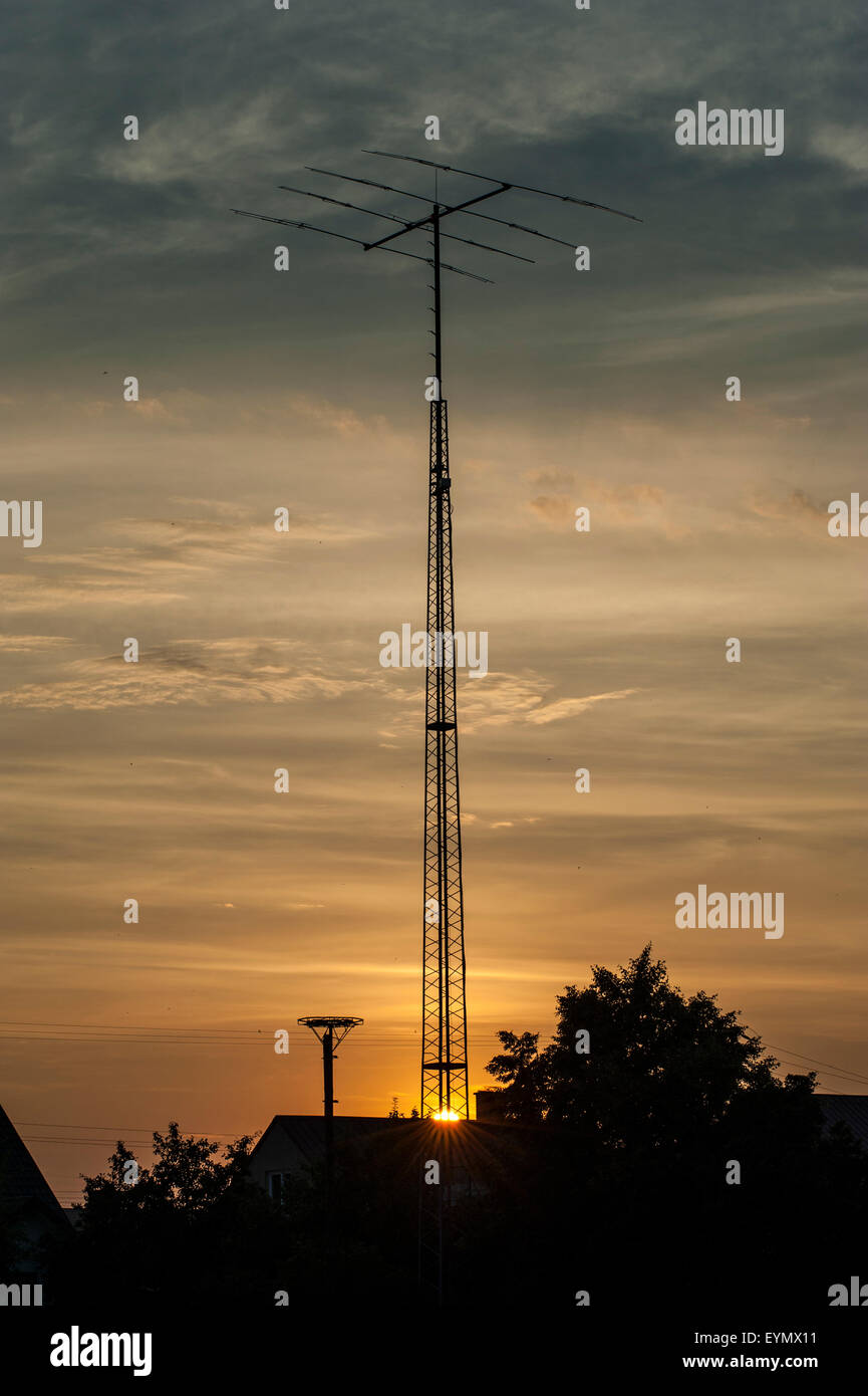 Amateur Radio antenna in north-eastern Poland at sunset. Stock Photo